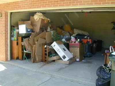 Overloaded garage before a full cleanout